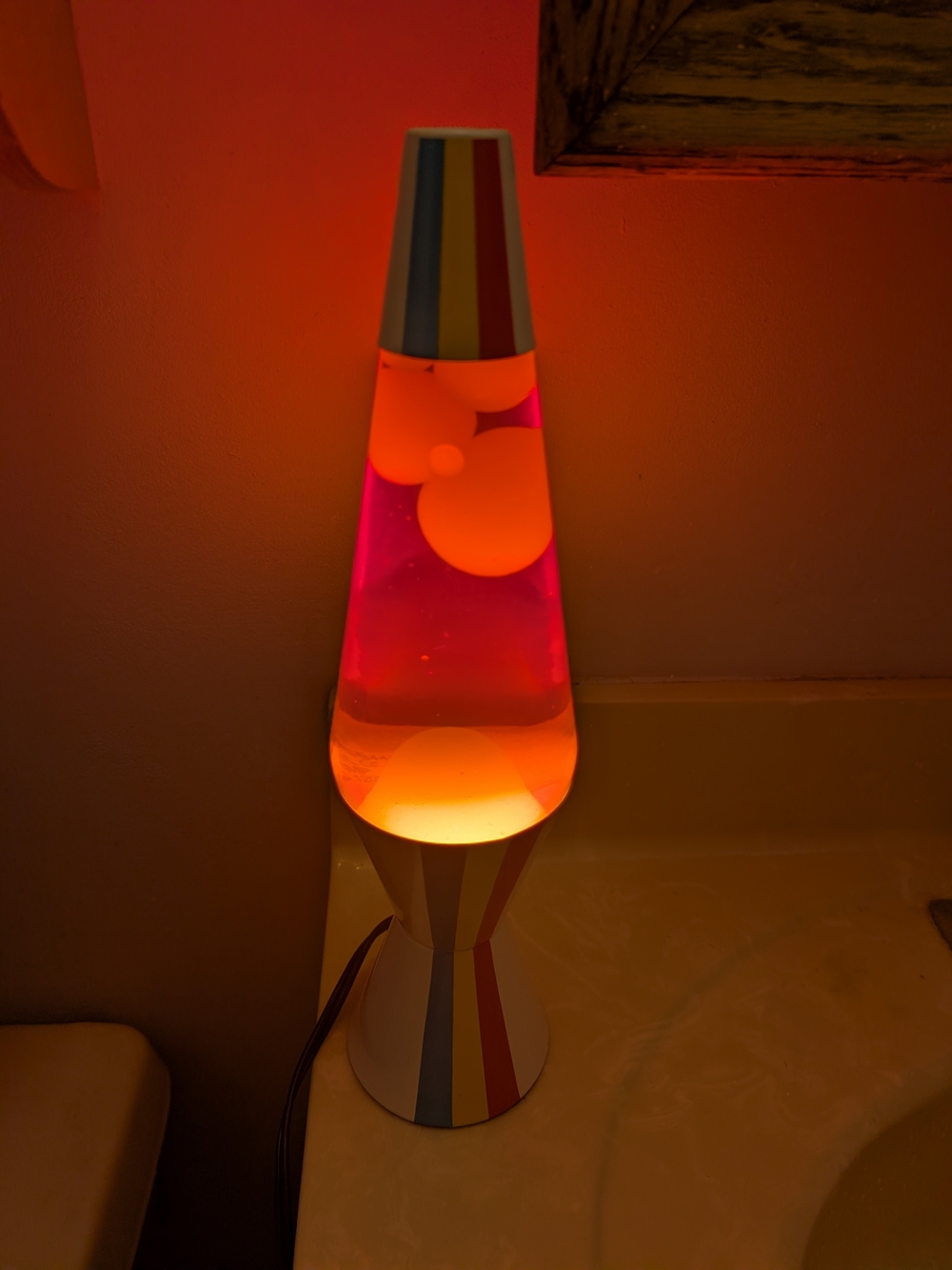 Lava lamp 14.5 Inch White With Rainbow Strips With Orange Colored Wax